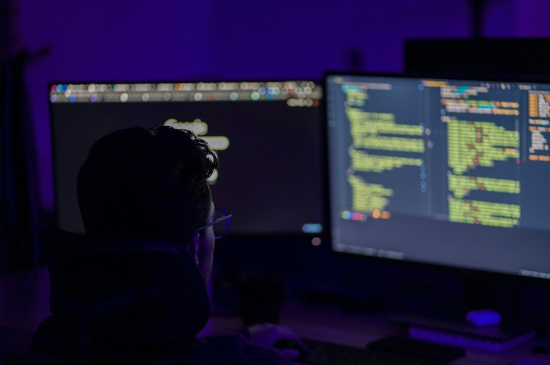young programmer at desk